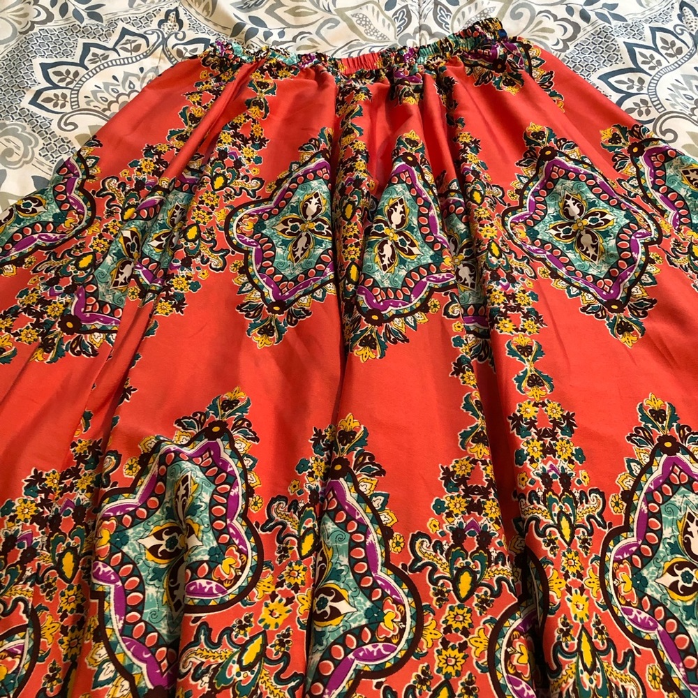 Long flowing skirt.
